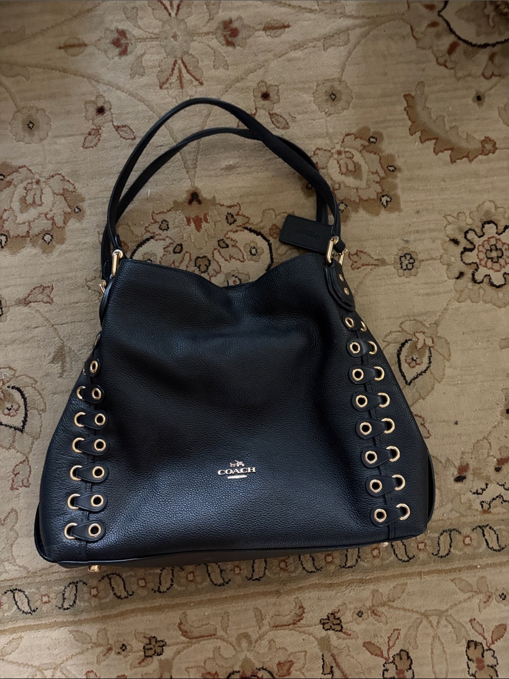 Coach Black Pebbled Leather Shoulder Bag with Gold Grommets